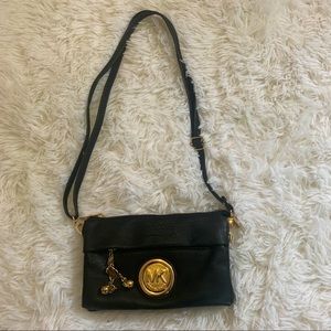 Black & gold mini MK purse